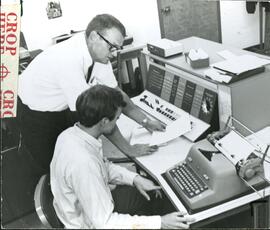 Student and Teacher with Typewriter