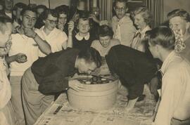 Students Bobbing for apples, 1954.