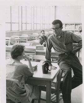 View of students in the library reading room, circa 1960's.