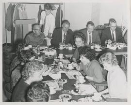 People in Rodli Commons eating at table, n.d.