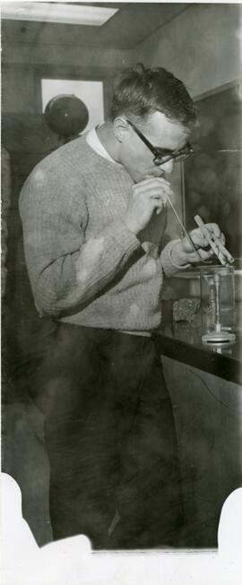 Student with chemistry equipment