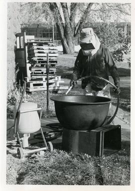 Preparing the bean soup pot.