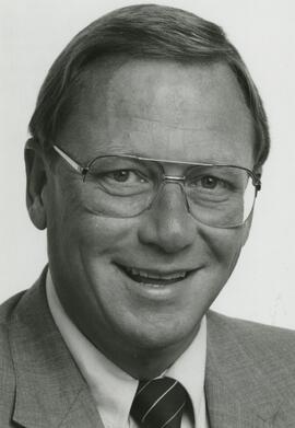 Headshot of Chuck Brictson smiling.