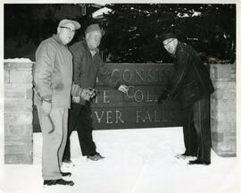 Employees installing the new Wisconsin State University Sign, 1964.