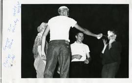 Students participating in freshman initiation activities, 1950-1970.