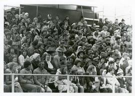 Spectators watching from the bleachers, no date.