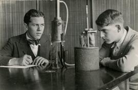 Two people using visual equipment