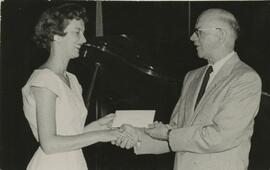 Elmer Benson shaking hands. 1954.