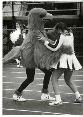 Falcon Mascot dancign with a cheerleader, no date.