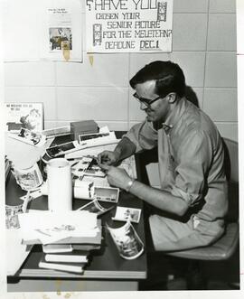 Jerry Frigo at a desk, 1968.