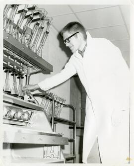 Person with large science equipment