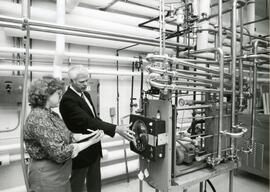 Pair looking at equipment