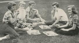 Women students seated on the grass, 1955.