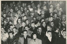 Crowd of people at an event.