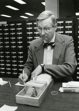 Noble Stockton using the library catalog, 1987.