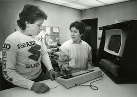 Student using a computer in the library, circa 1990's