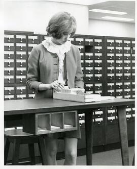 Using the library catalog, circa 1950s.