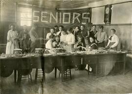 Senior class preparing for candy sale, 1912.