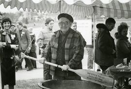 Dr. Thoreson holdign the bean soup paddel, 1984.