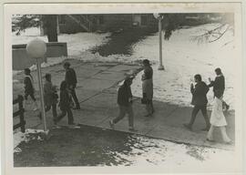 Students walking on campus.