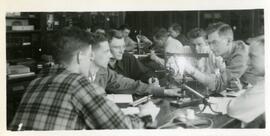 Group looking at a lightbulb