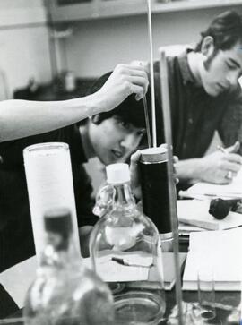 Students using science equipment