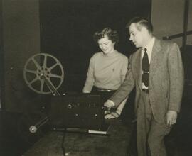 Setting up a film projector.