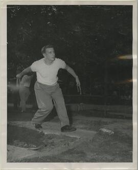 Man throwing a horseshoe, no date.