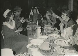 Group of students eating at Madrigal Banquet.