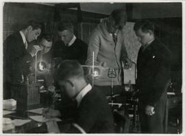 Students around equipment and lights