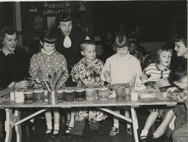 Children Painting around Christmastime