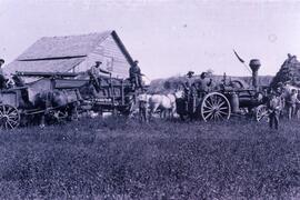 John and Frank Wild farming with threshing machine, circa 1890