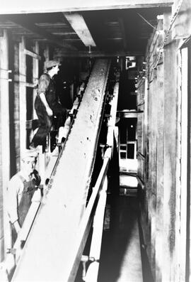 Bay City: Sand company, sand mine, 1937, top, Duke Hapton, bottom, Frank Minder, conveyer carries...