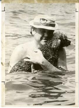 St. Croix River swimmer with dog, May 1977