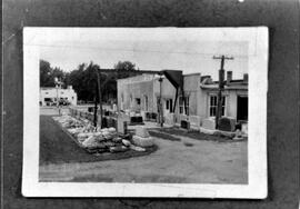 River Falls: Businesses, Melgard Monument, undated