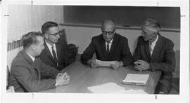 Hudson: schools, people, l to r, Kenneth Lantto, Neil Miller, Pres Micheels, Alvin Weitkamp, Confer on industrial arts teachers program, 8 October 1964
