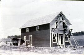 Construction around Young's Store in Rock Elm, 1889