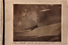 Woodville: miscellaneous, railroads, steam freight leaving old depot, crossing bridge, undated