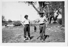 Elli or Li Slater and father with fish, circa 1950