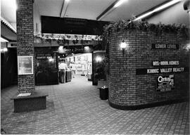 Lower level interior shops in River Falls Mall, undated