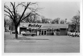 River Falls: Businesses, automotive service stations (gasoline sales), Holiday Station, undated