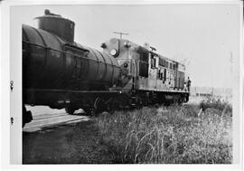 Hudson: railroads, extinct type of Chicago and Northwestern Railroad diesel at Hudson, October 1957